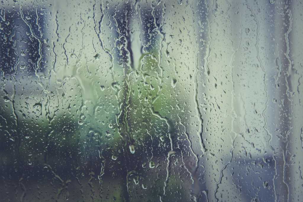 Does your double glazing need replacing? Image of rain on a window